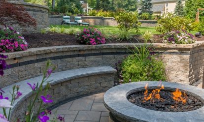Low seat wall with fire pit centerpiece