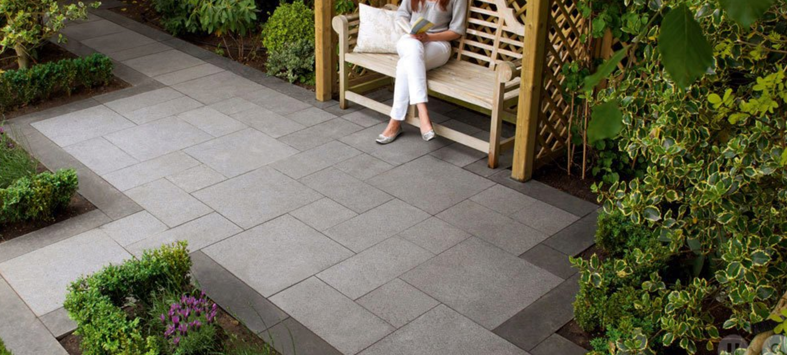 adding natural stone or concrete pavers to your outdoor spaces 