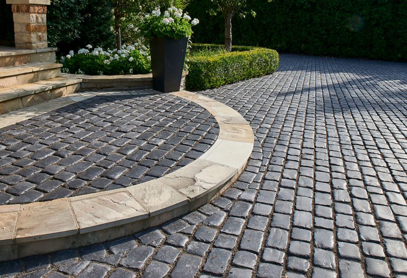 Curved Step at Entrance with Unilock Pavers