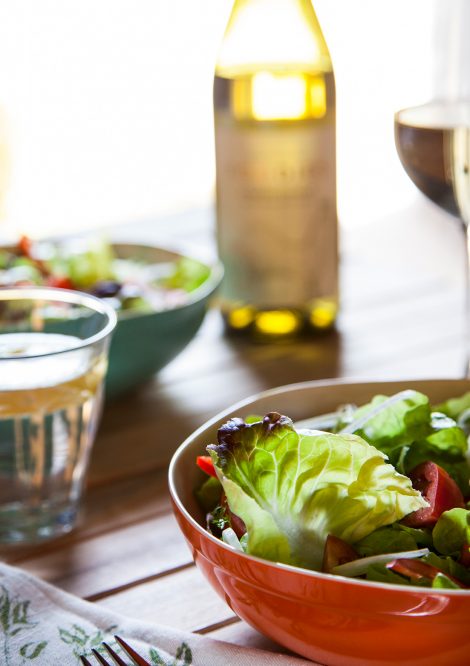 Dining Table set with Salad and Wine