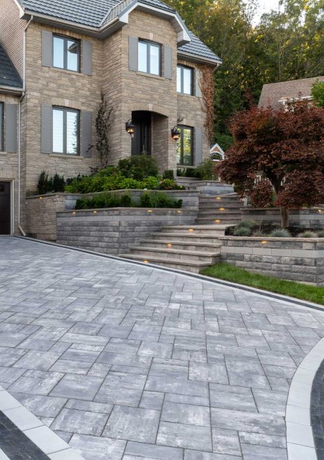 Unilock Paver Driveway with Boarders and Steps to Front Entrance