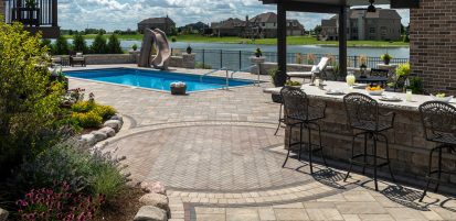 Outdoor Kitchen and Pool Deck Patio with Circular Design