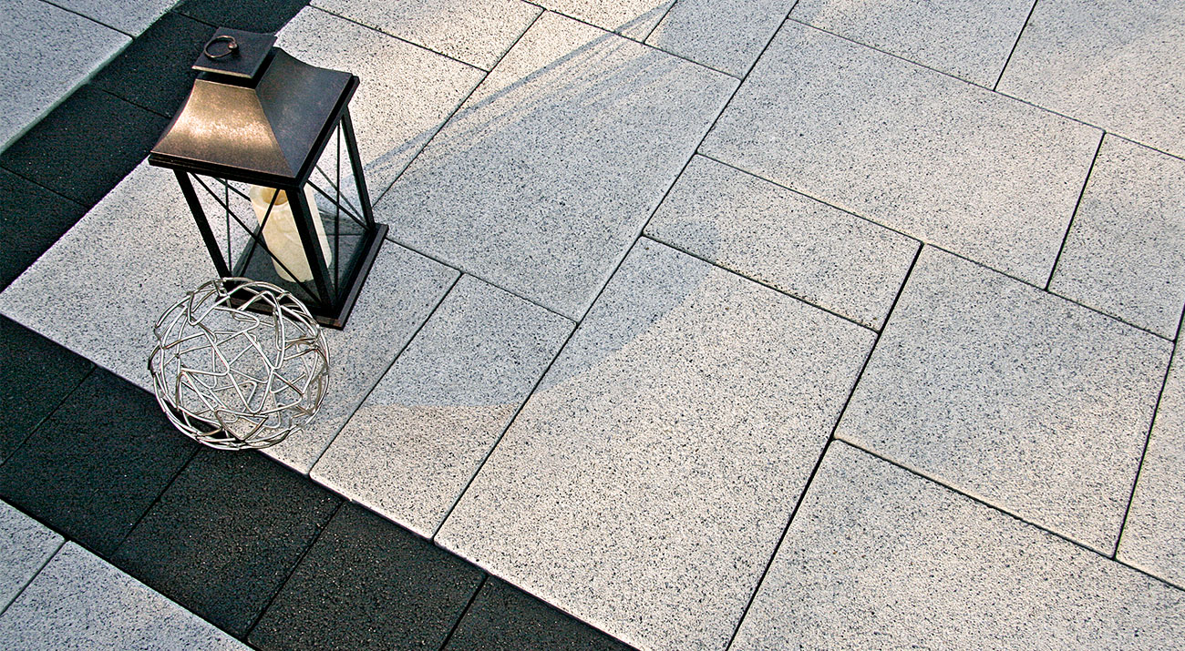 Unilock Series exposed agregate EnduraColor paver patio