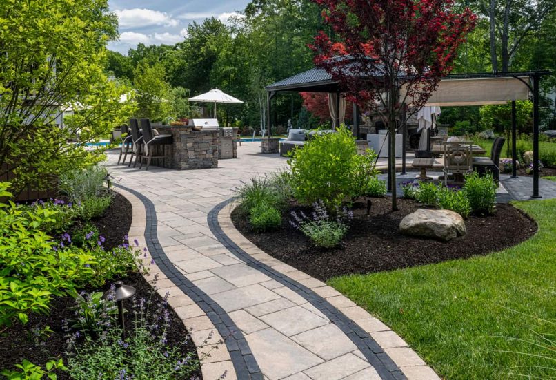 Curvy Walkway with Boarders to Outdoor Living Space