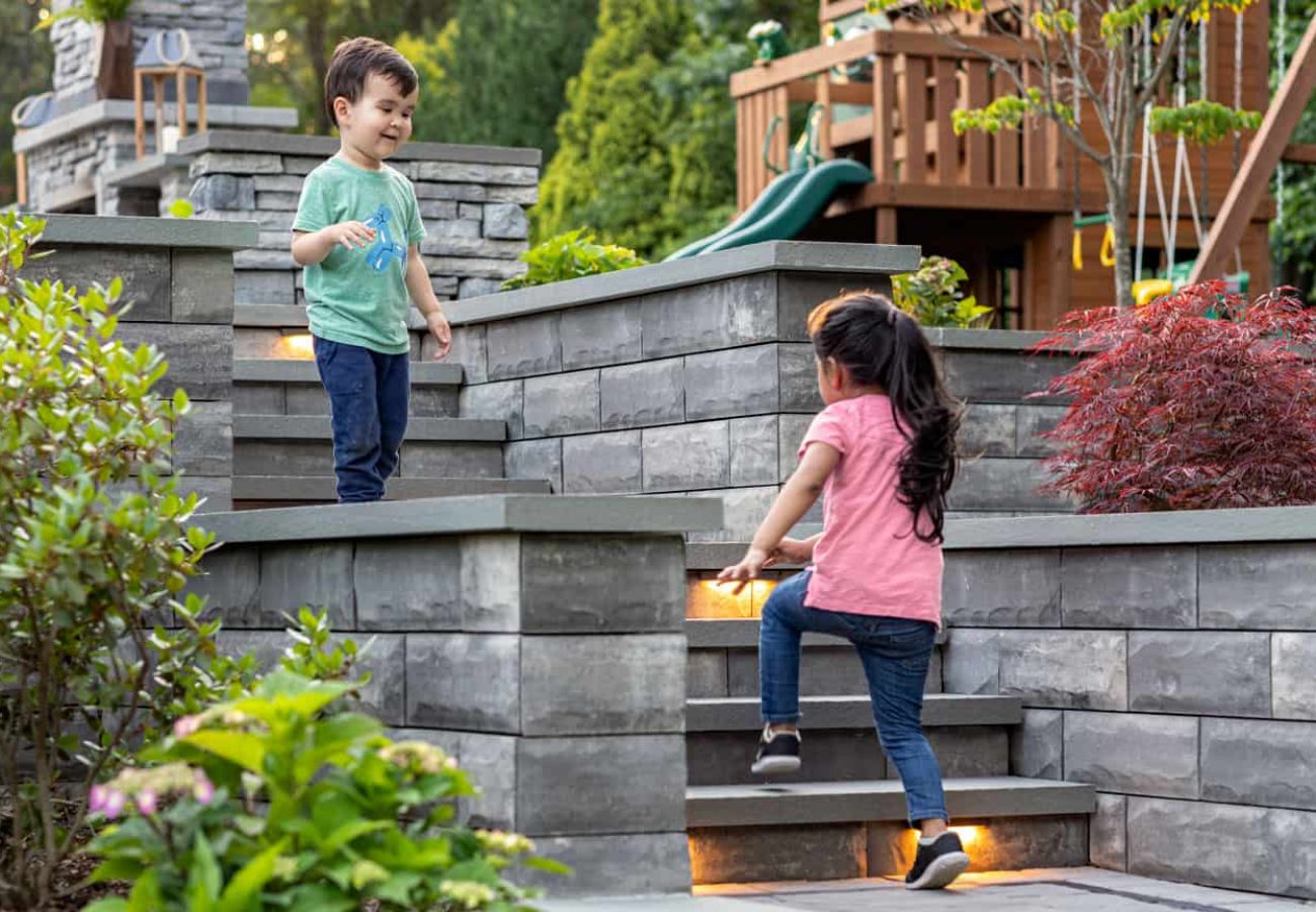 Children Walking on Steps with Lighting with Multi-Level Retaining Walls
