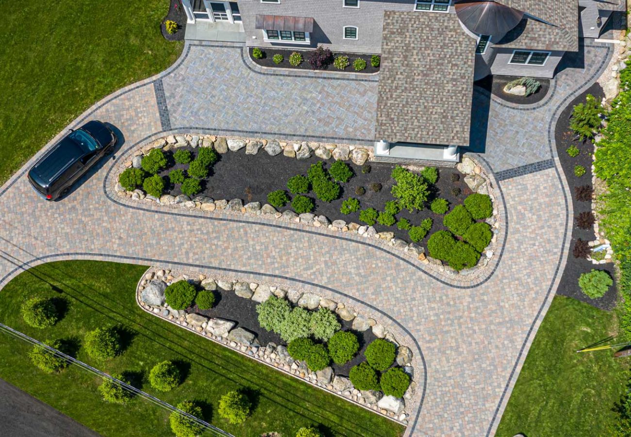 Birds eye view of Curvy Driveway with Boarders and Garden in the Center