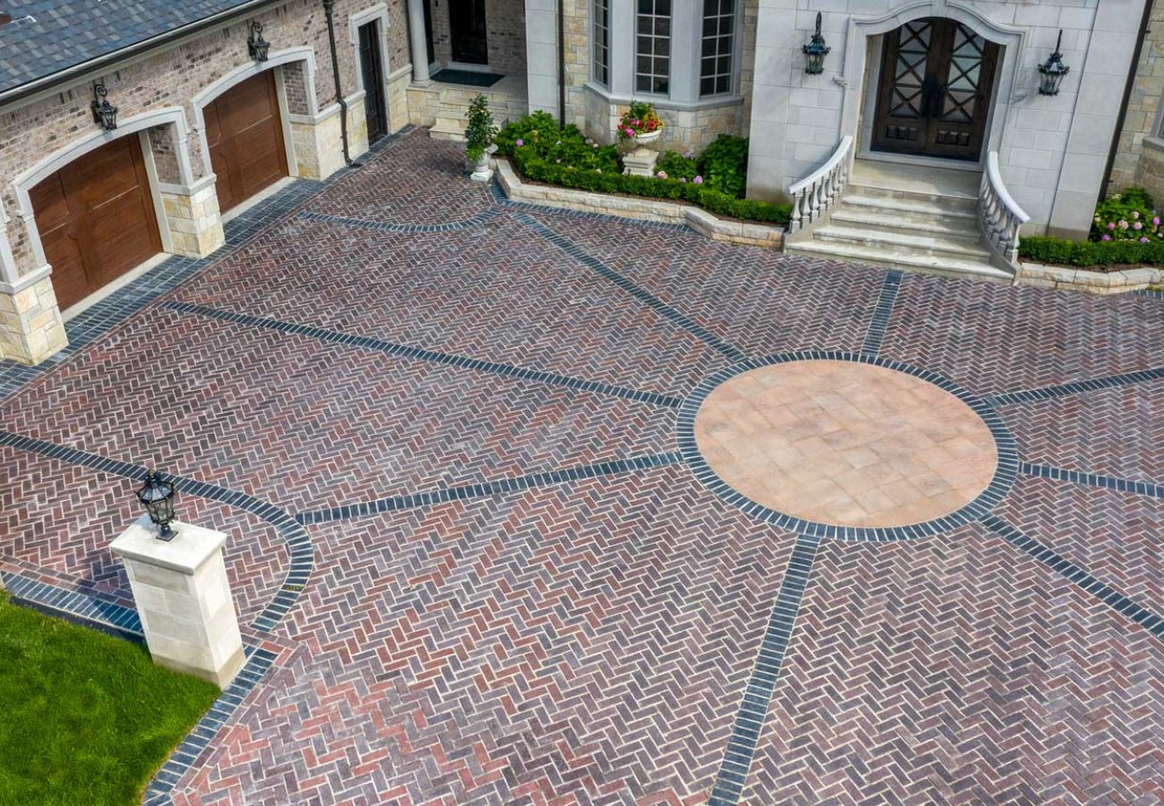 Birds eye view of Unilock Driveway with Boarders and Unique Design