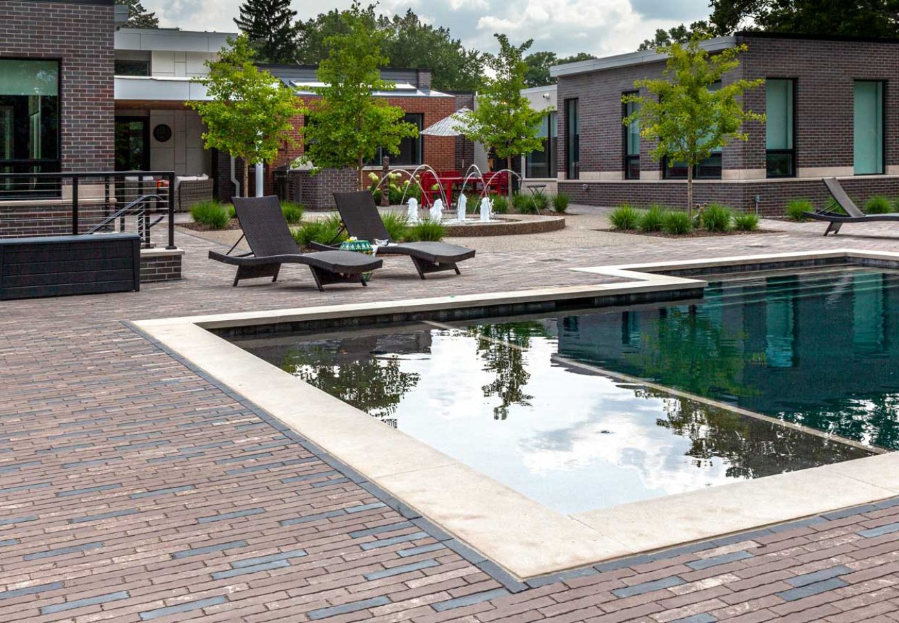 Modern Outdoor Paver Pool Deck with Pool Coping
