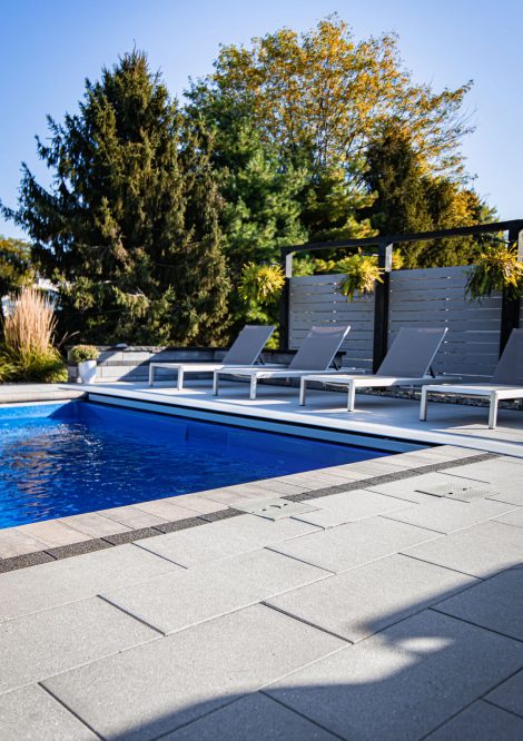 Unilock Pool Deck with Boarders and Pool Coping
