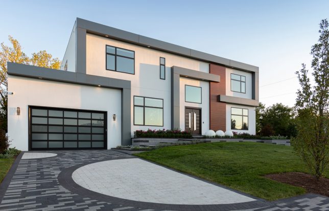 Modern Home with Interlocking Unilock Driveway with Unique Half Circle Design
