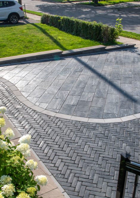 Interlocking Driveway with Curved Boarder Dividing new Paver Section