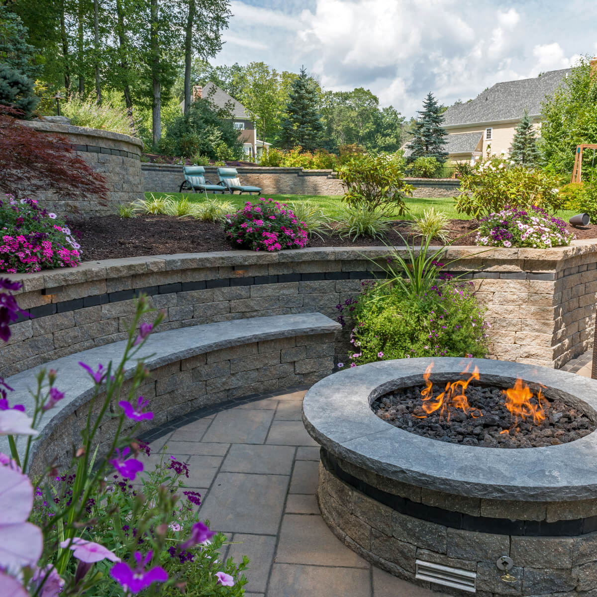 Curved Retaining Walls with Seating by Outdoor Fire Pit