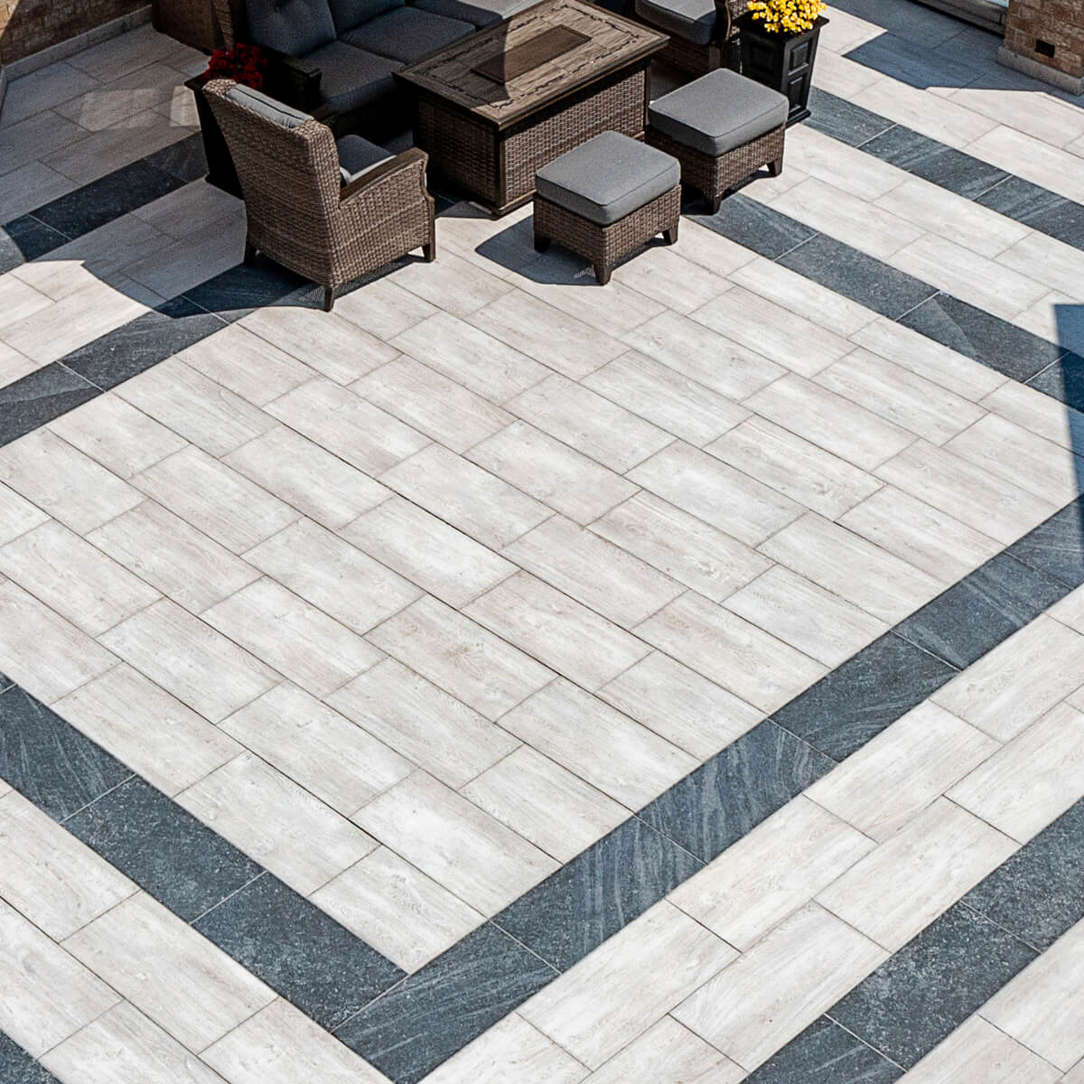 Unilock Porcelain Tile Patio with Contrasting Boarders