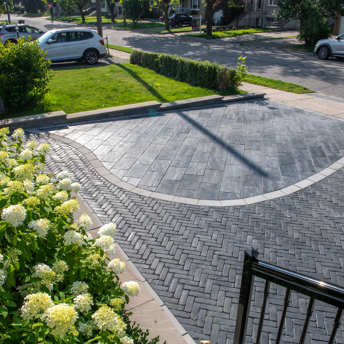 Driveway pavers with curved design