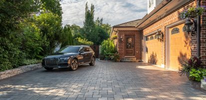 Unilock flagstone-textured driveway, with Richcliff Elegance pavers