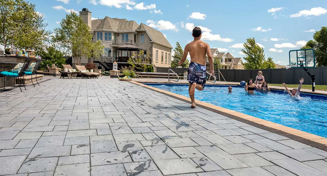 Large paver patio with swimming pool coping inspiration