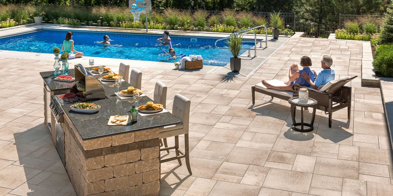 Outdoor Kitchen With Grill Island And Paver Patio Unilock