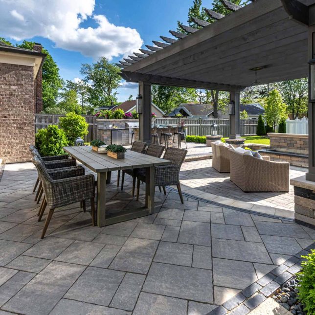 Casual Elegant Backyard Patio with Boarders and Pillars under Gazebo