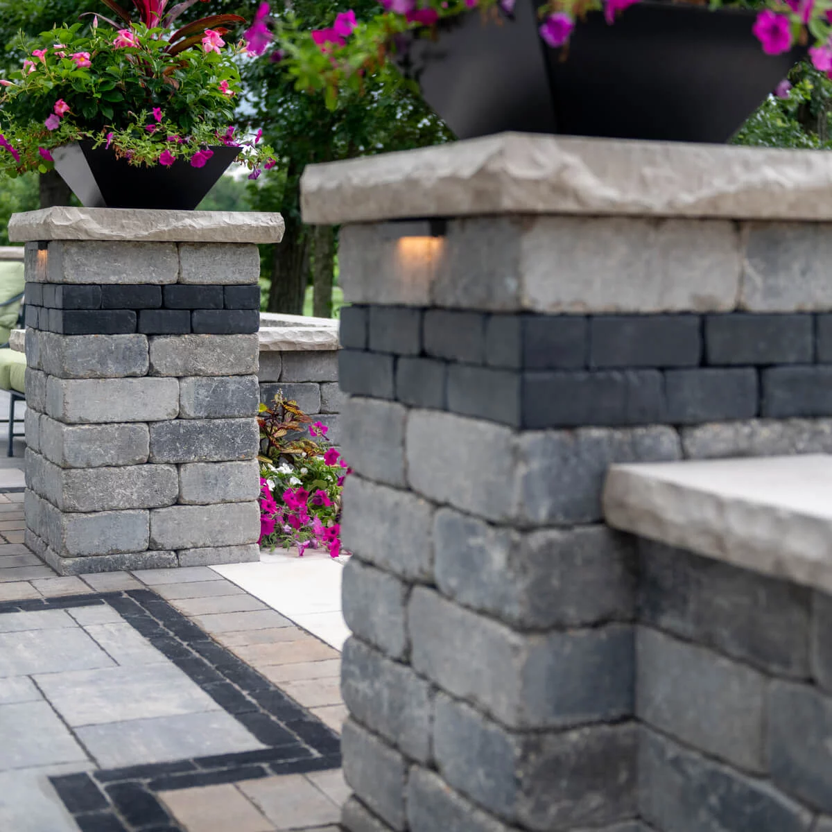 Unilock Decorative Pillars with Pillar Caps at Patio Entrance