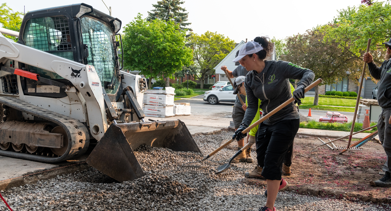 Contractor crew preparing for paver installation