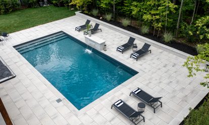 Paver patio with swimming pool and coping
