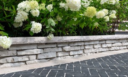 Garden wall with paver patio inspiration