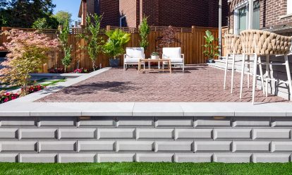 Retaining wall with patio hardscaping