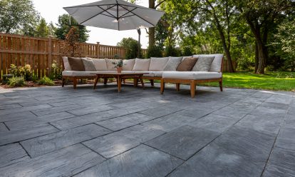 Paver Patio with sectional and umbrella