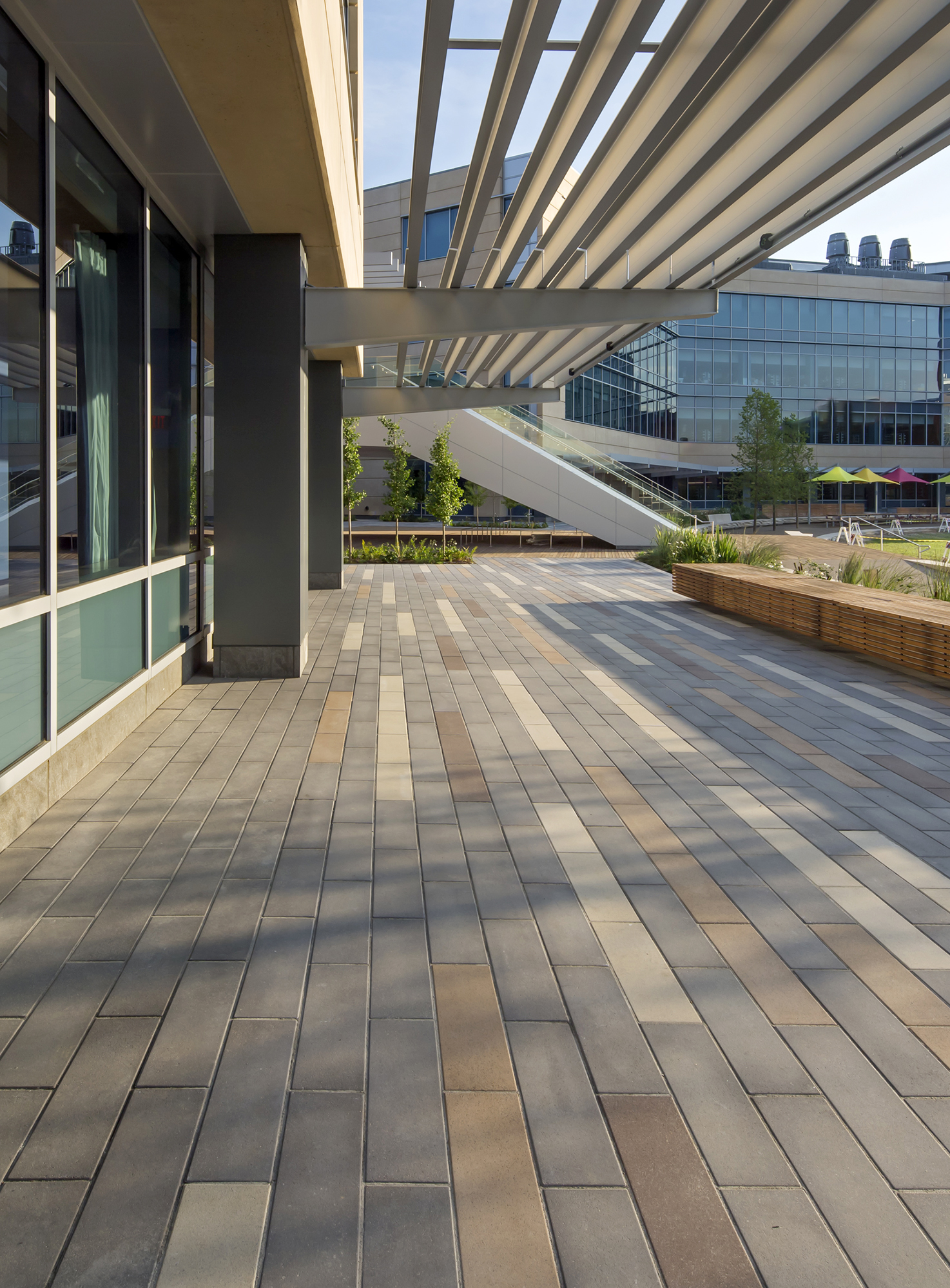Promenade Planks in four unique colors  make a walking area under a pagoda beside the Hudson Valley Office Complex.