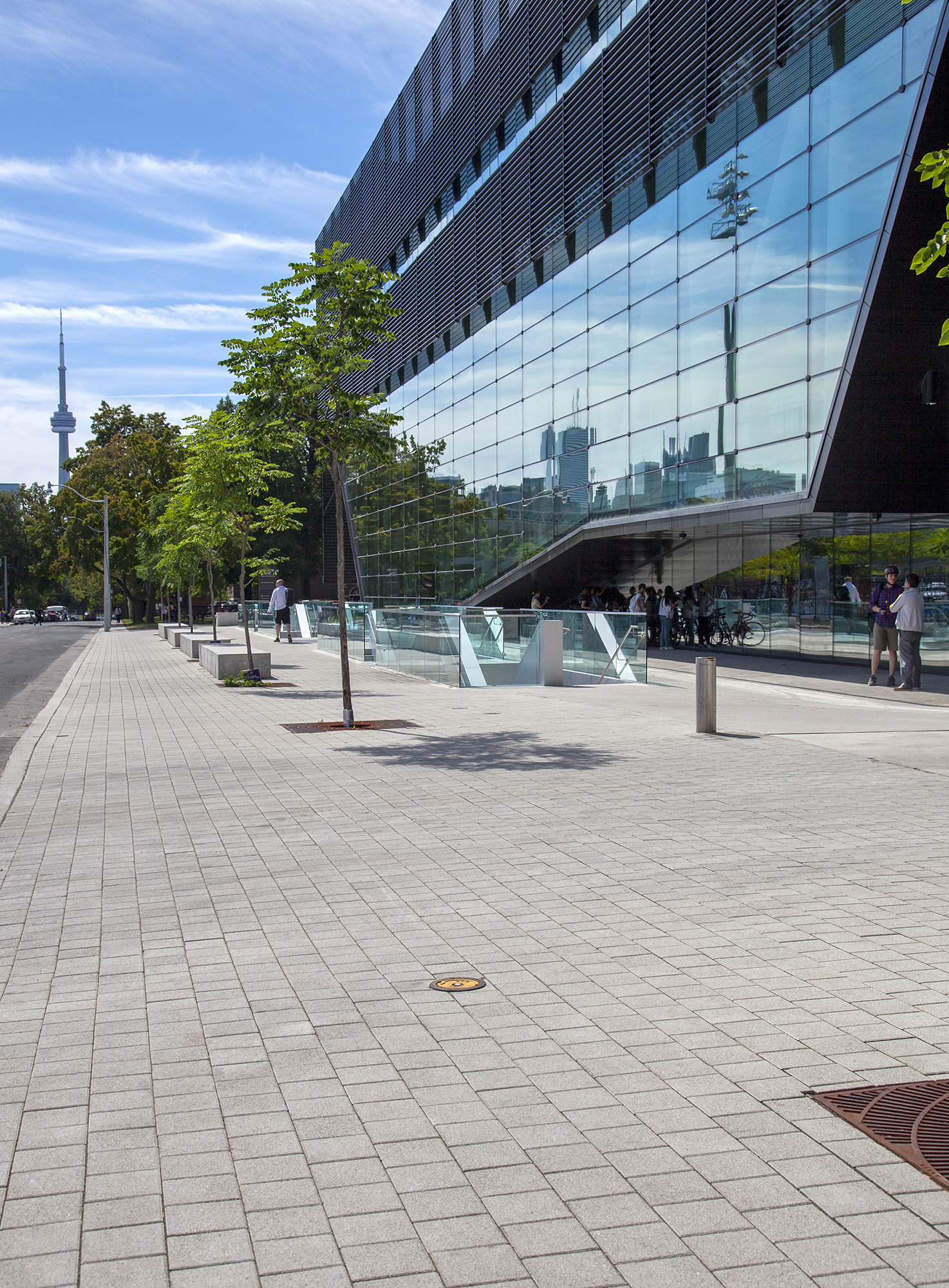 Muted Eco-Optiloc pavers elevate the visual appeal of nearby trees and the glass architecture of the student center.