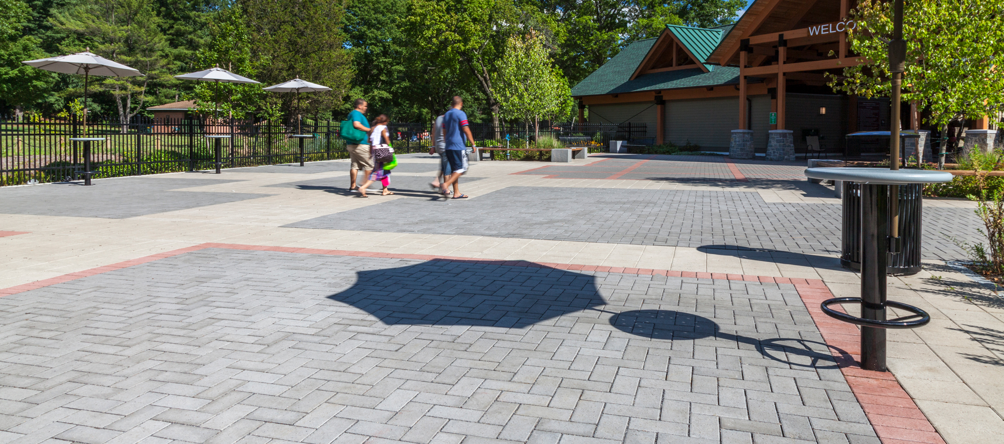 Patterned blocks of grey Eco-Priora, bordered by red and beige Europaver, serve as the main paver floor for visitors at FDR State Park.