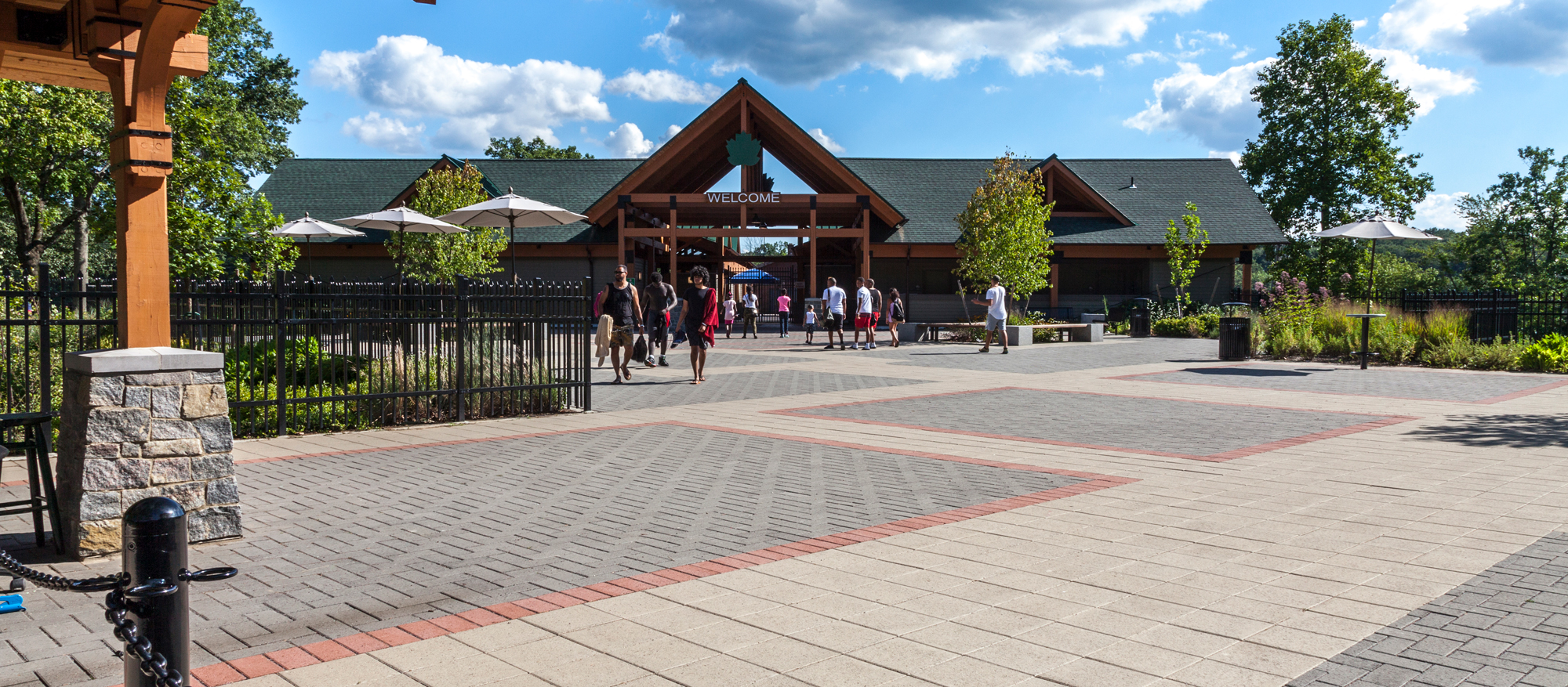 Patterned blocks of grey Eco-Priora, bordered by red and beige Europaver, serve as the main paver floor for visitors at FDR State Park.