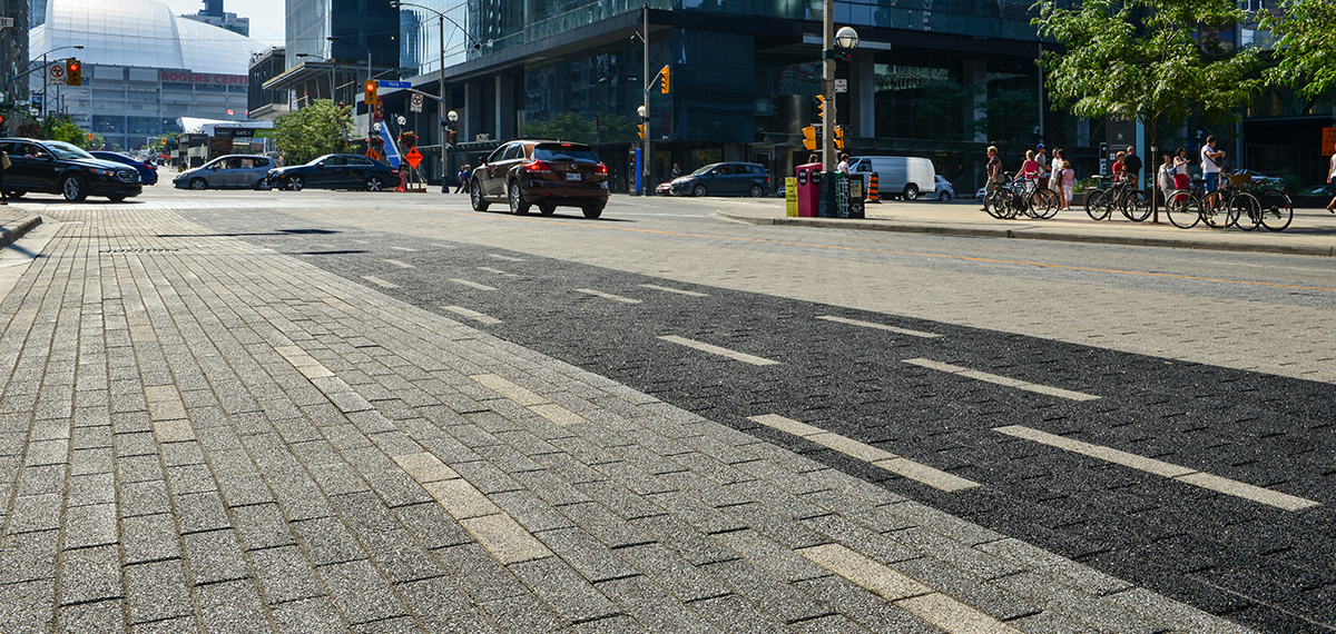 Pavers alongside a busy street in Ontario
